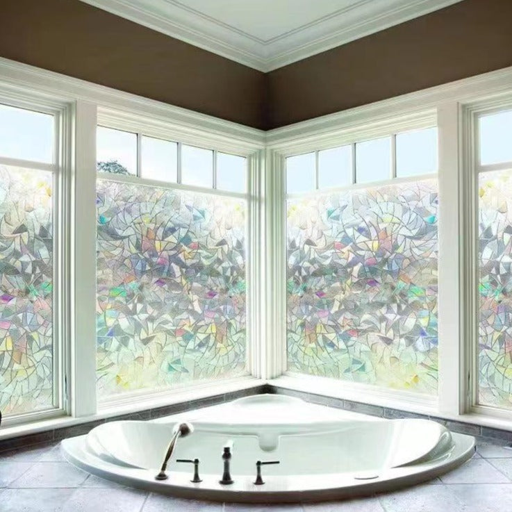View of a living room brightened by rainbow reflections from a LumiSuncatch prism window sticker.