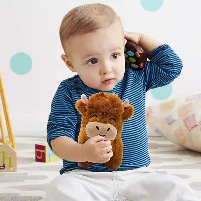 Realistic cotton Highland cow plush toy, a soft cuddly toy and decorative figure.