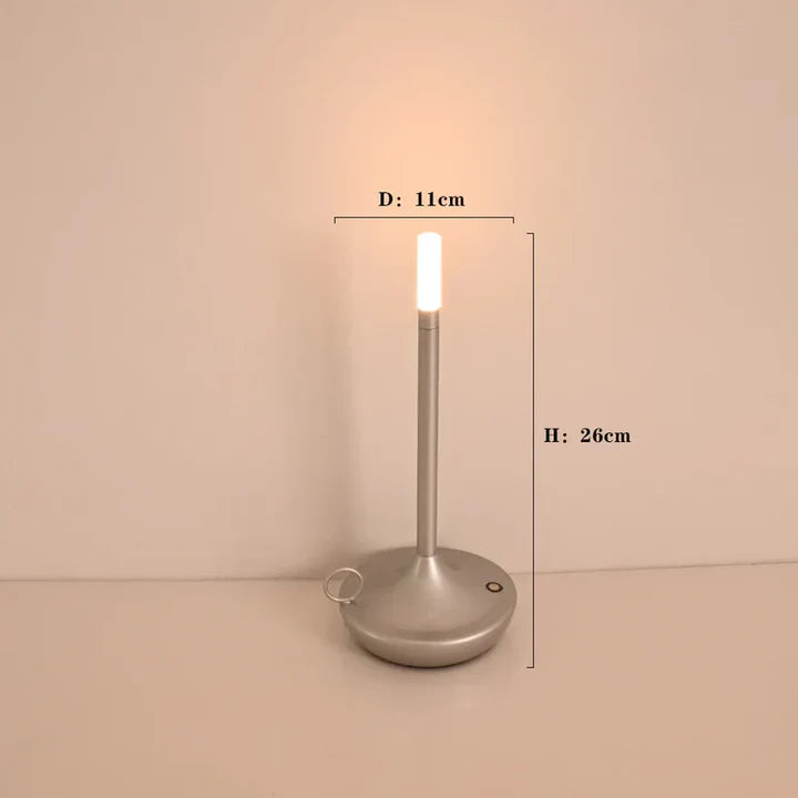 Sleek modern rechargeable dimmable LED candle table lamp with touch control, perfect for ambient lighting & decor.