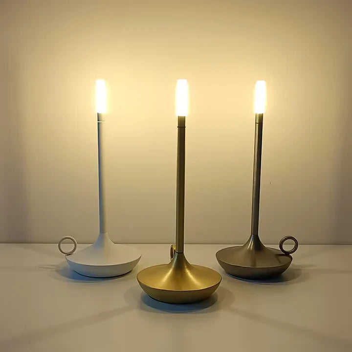 Dimmable LED candle table lamp, rechargeable and portable. Modern touch control for ambient lighting in any space.