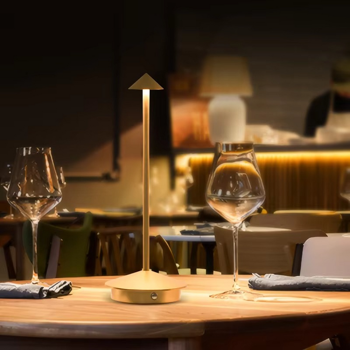 Portable rechargeable LED desk lamp. Touch control, 3 light modes, perfect for bedside or office ambient lighting.