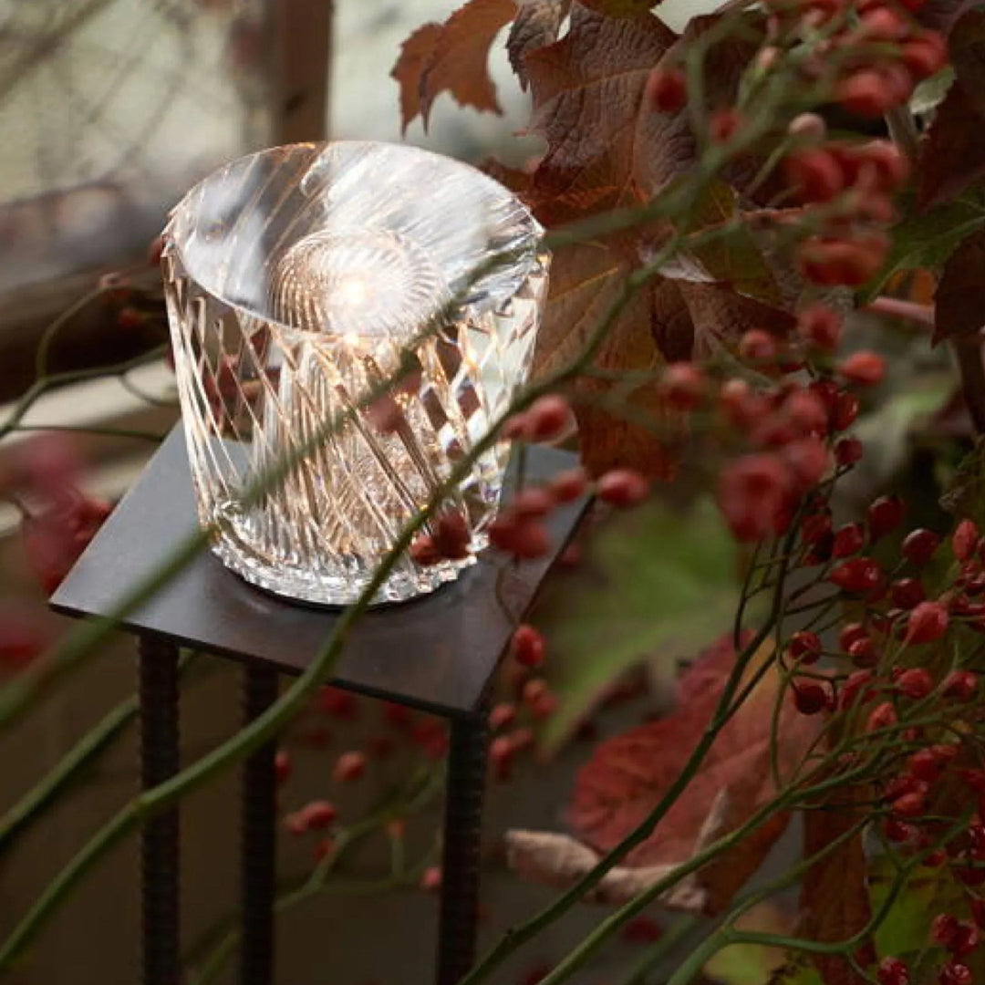 Sophisticated LED crystal lamp, diamond-cut design, rechargeable table light.
