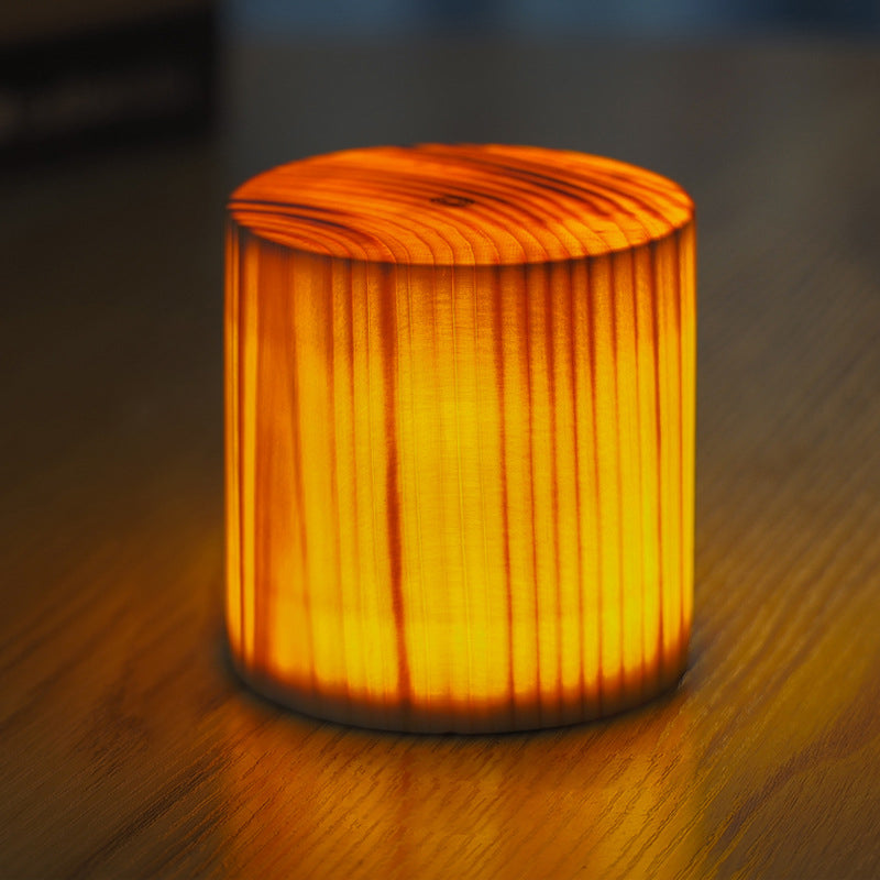 Stylish rechargeable LED desk lamp featuring a realistic wood grain finish & touch control.