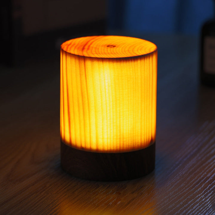 Accent lighting: Wood grain LED table lamp, cordless for versatile home placement.