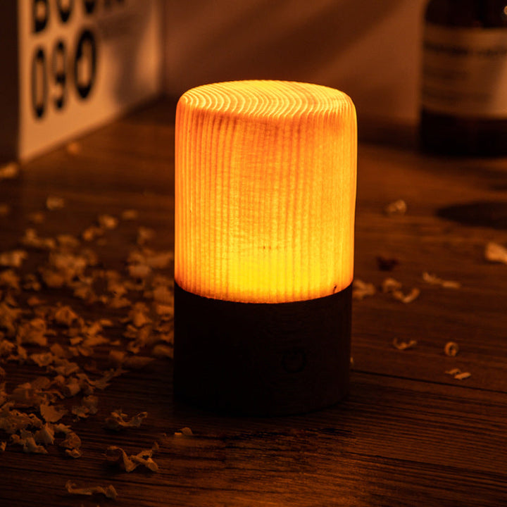 Sleek rechargeable LED lamp with authentic wood grain, enhancing any modern space.