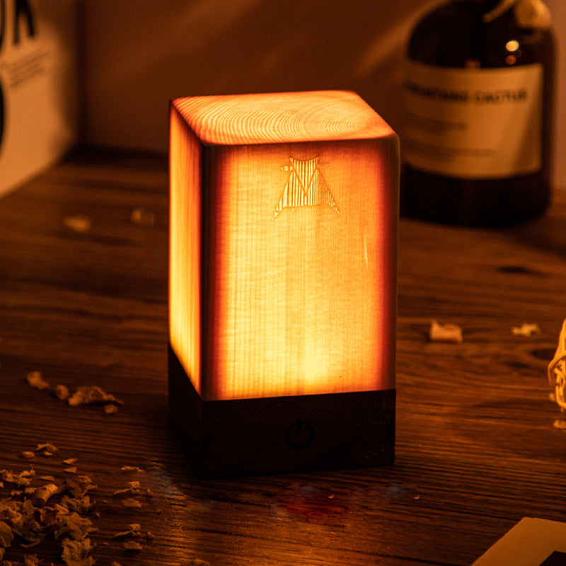 WoodGlow LED table lamp: rechargeable, cordless, & touch-controlled with wood finish.