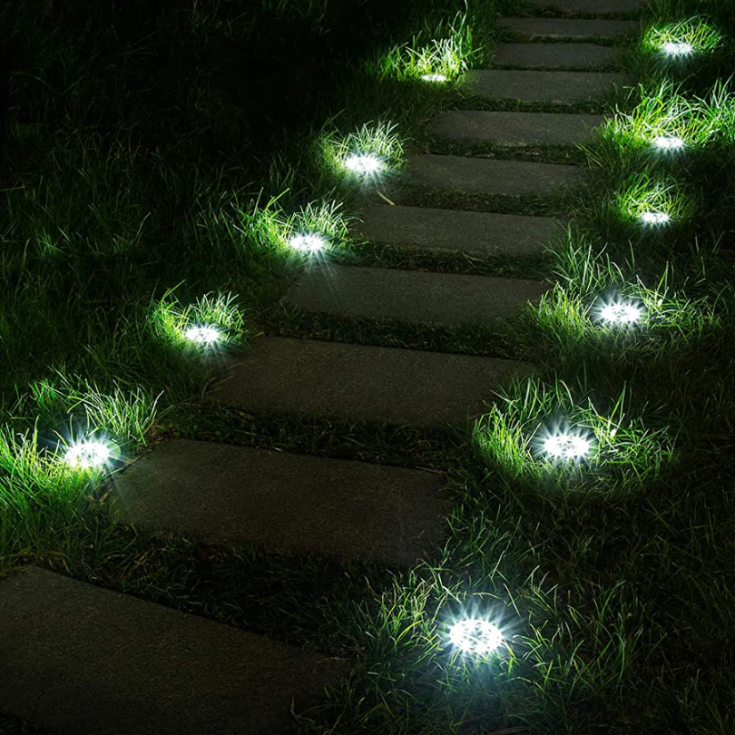Sustainable outdoor solar lights. Rechargeable, weatherproof garden lamps for automatic, eco-friendly landscape decor.