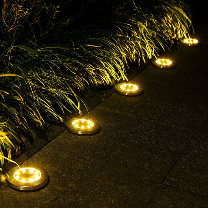 Durable solar outdoor lights, perfect for garden paths & patio decor. Rechargeable & weatherproof for year-round use.