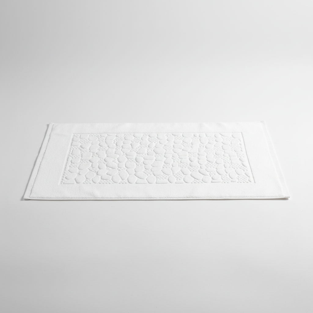 Unisex rectangular geometric cotton bath mat, highly absorbent, perfect for modern bathroom decor.