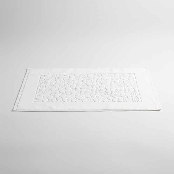 Unisex rectangular geometric cotton bath mat, highly absorbent, perfect for modern bathroom decor.