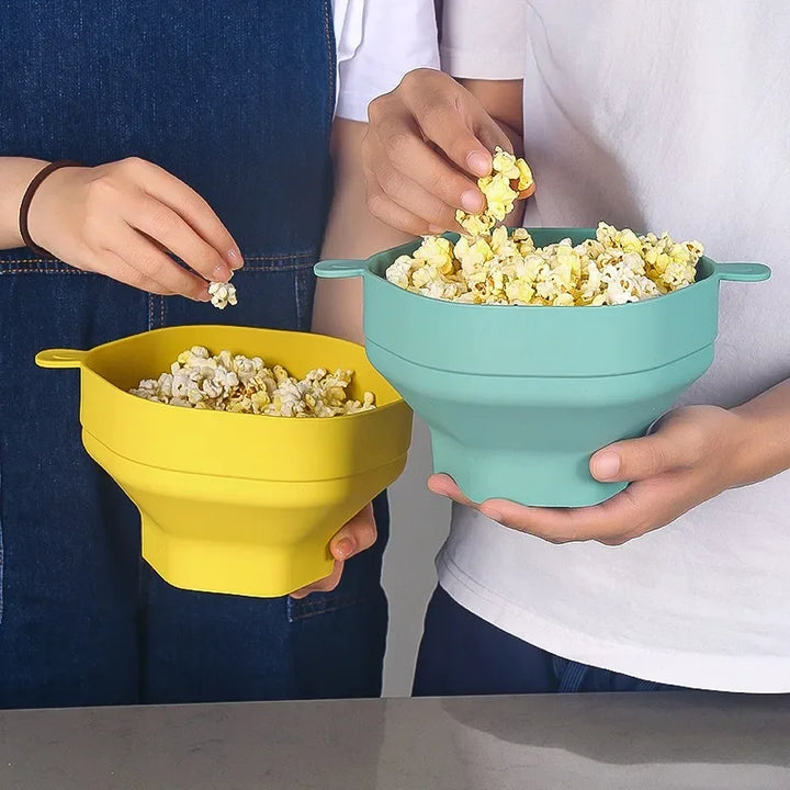 Foldable mint silicone popcorn maker for microwave. Healthy, oil-free homemade popcorn. Reusable kitchen essential.
