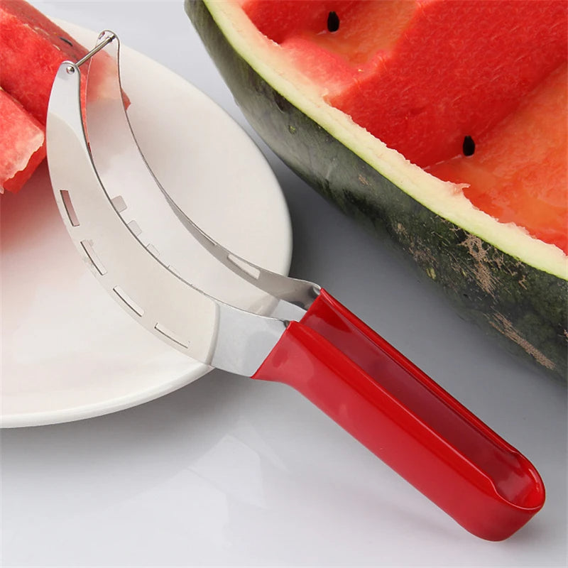 Red FruitFlow kitchen fruit slicer. Quick & easy stainless steel gadget for healthy fruit prep & cooking.