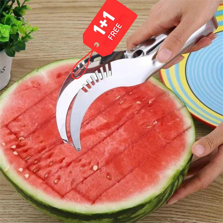 Hand holding the red FruitFlow fruit slicer, demonstrating its ease of use for quick kitchen prep.