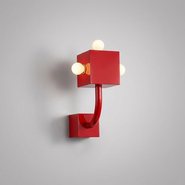 Modern red metal CubiLuxe wall light, a geometric three-bulb sconce ideal for contemporary home decor
