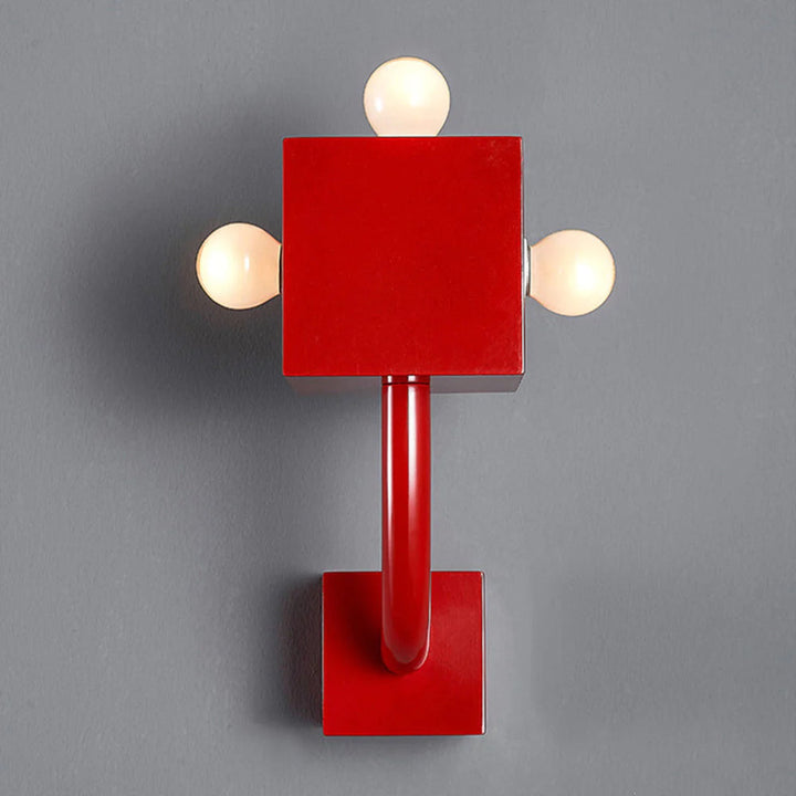 Red geometric metal wall sconce, a three-bulb CubiLuxe decorative fixture for modern home ambient lighting