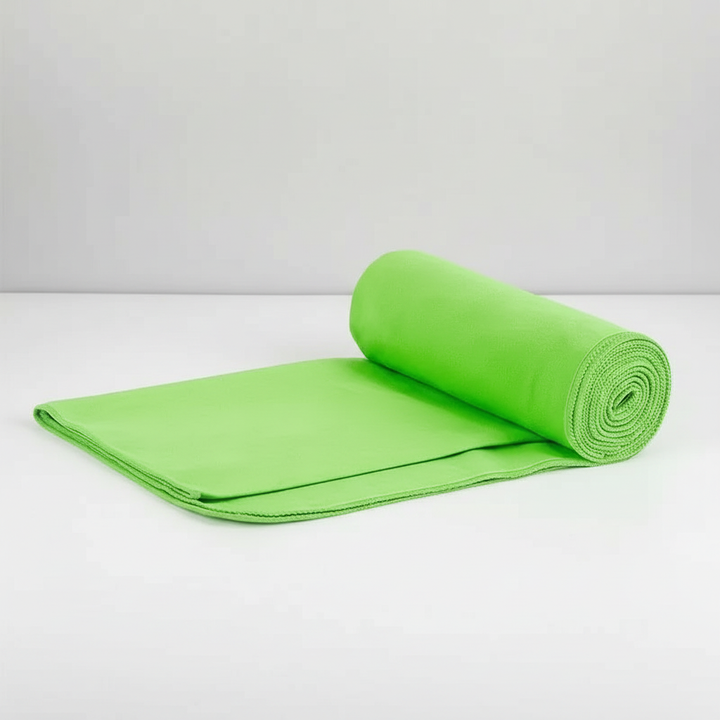 Person holding a lightweight quick-dry microfiber towel after a workout, absorbent