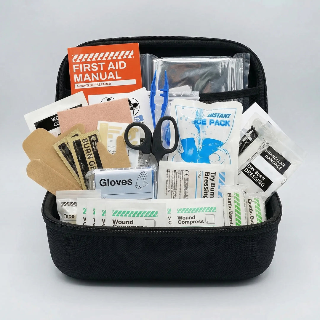 Red portable outdoor first aid kit with carabiner for quick access during hiking, camping, or travel.