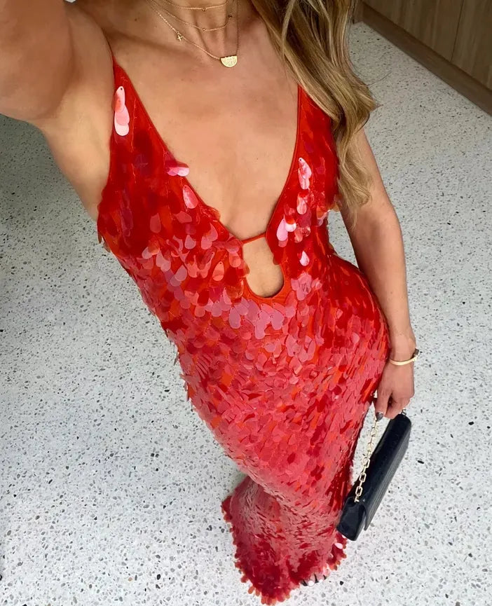 Women's red sequin formal dress. Backless evening gown with a flattering mermaid fit for homecoming.