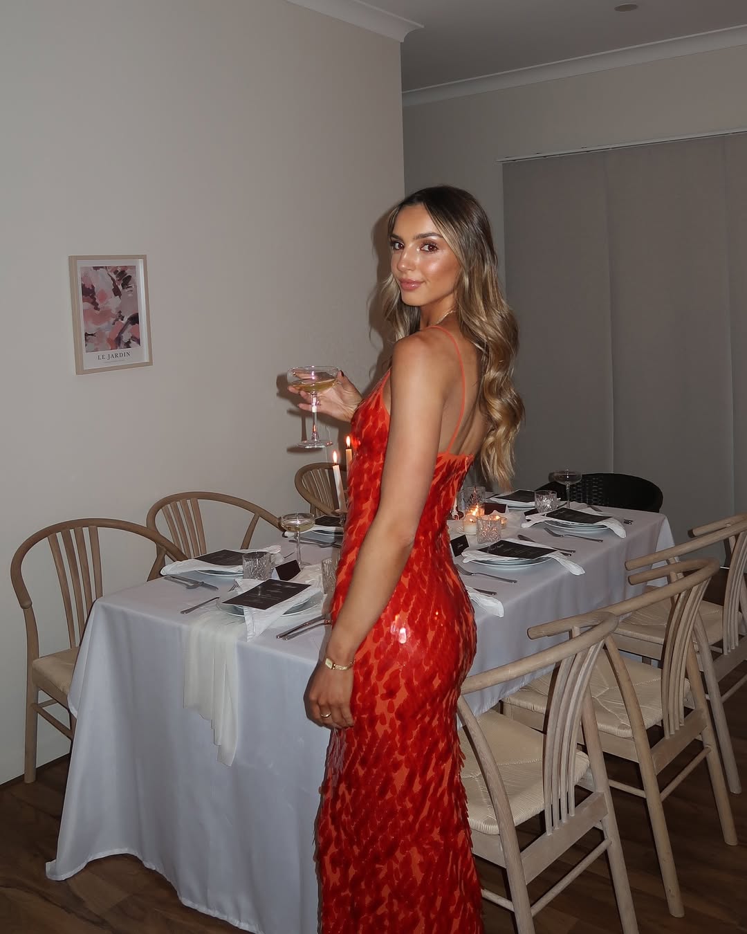 Dazzling red sequin backless dress, ideal for prom or homecoming. A glamorous women's formal evening gown.