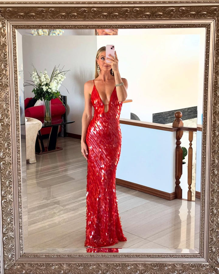 Elegant women's red sequin mermaid dress. Features a chic backless design, perfect for any formal special occasion.