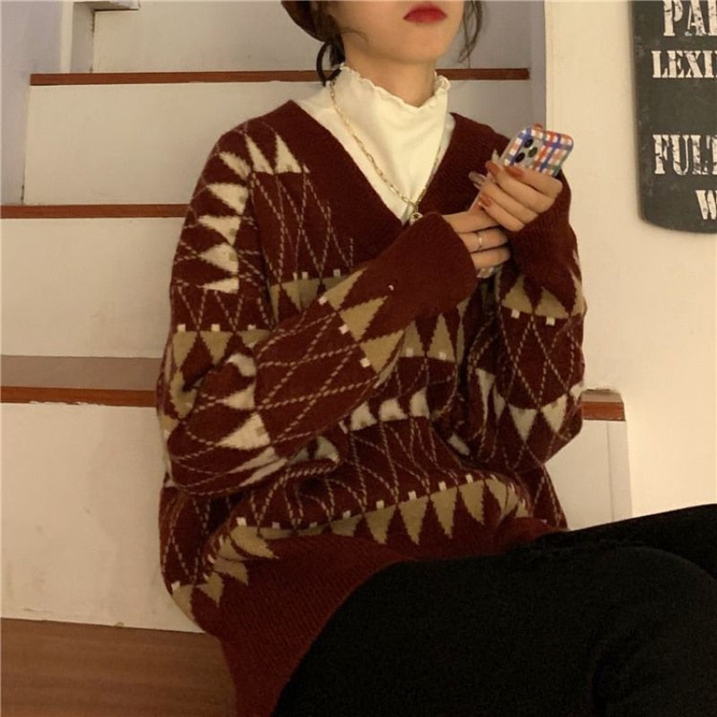 Chic beige aesthetic women's sweater. Loose fit long sleeve pullover top, versatile for everyday casual wear.
