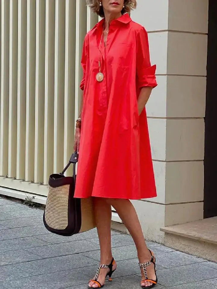 Women's long sleeve A-line midi shirt dress with button front. Comfortable relaxed fit for casual or smart casual everyday wear.