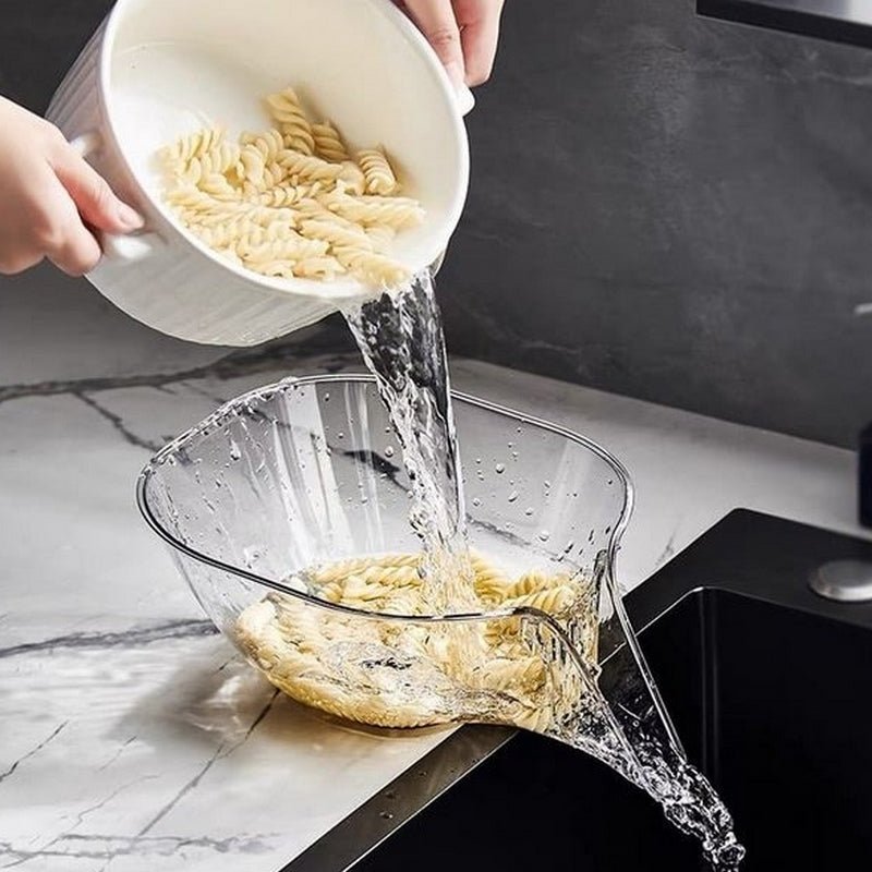 Compact gray plastic dish drainer. Removable kitchen sink drying basket for efficient space-saving.