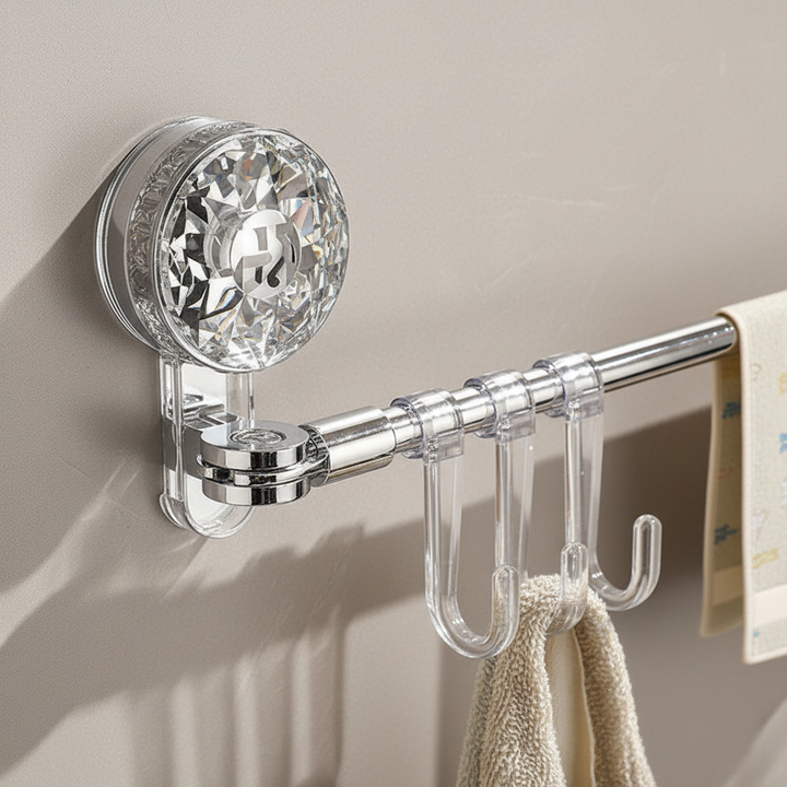 White retractable wall mount rack with black hooks, perfect for kitchen storage or bathroom organization, easy suction cup install