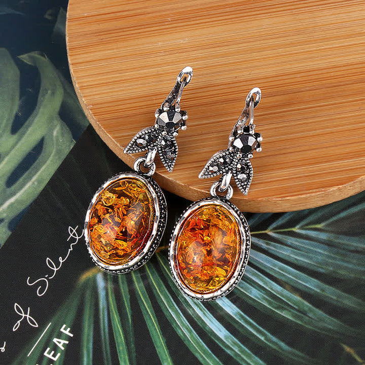 Retro amber flower dangle earrings for women, elegant silver jewelry.