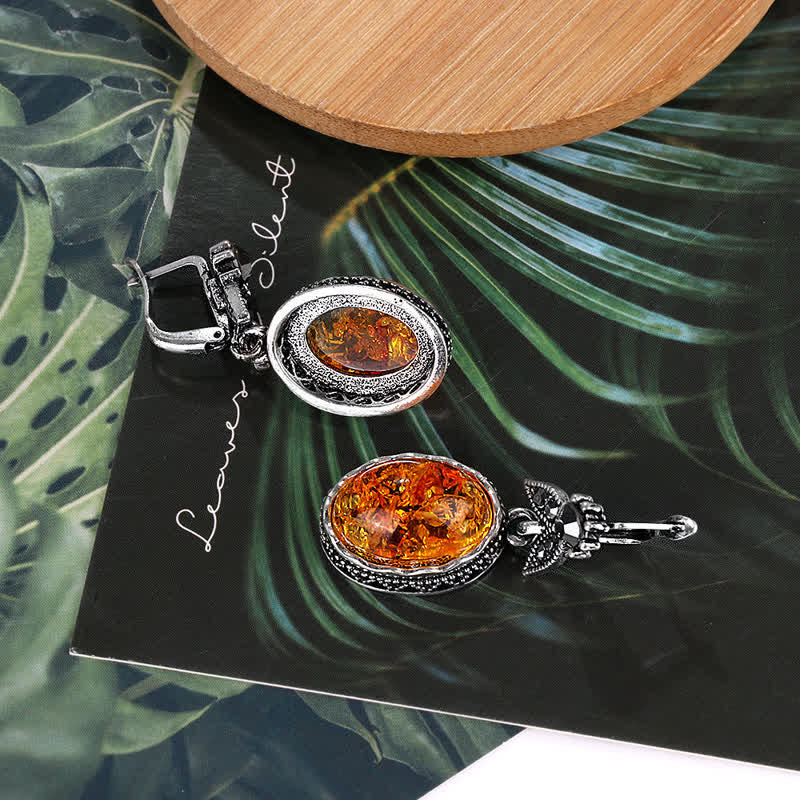 Vintage style women's dangle earrings, retro amber flower design, perfect for any occasion.