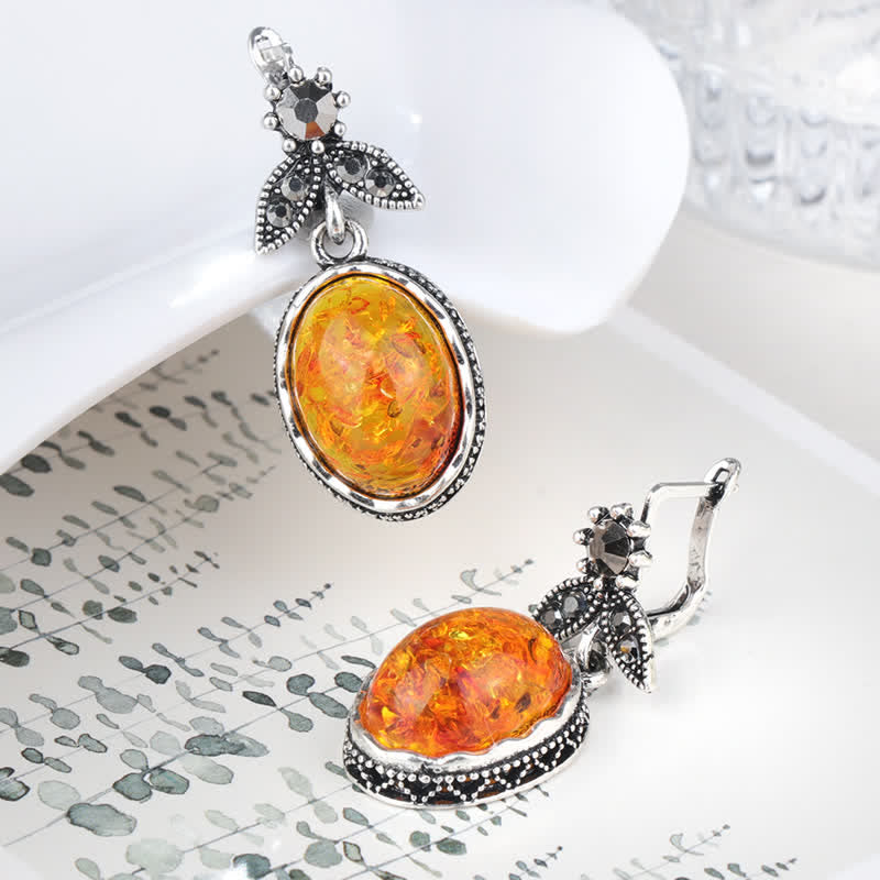Warm amber flower dangle earrings in a retro silver design, women's vintage style jewelry.
