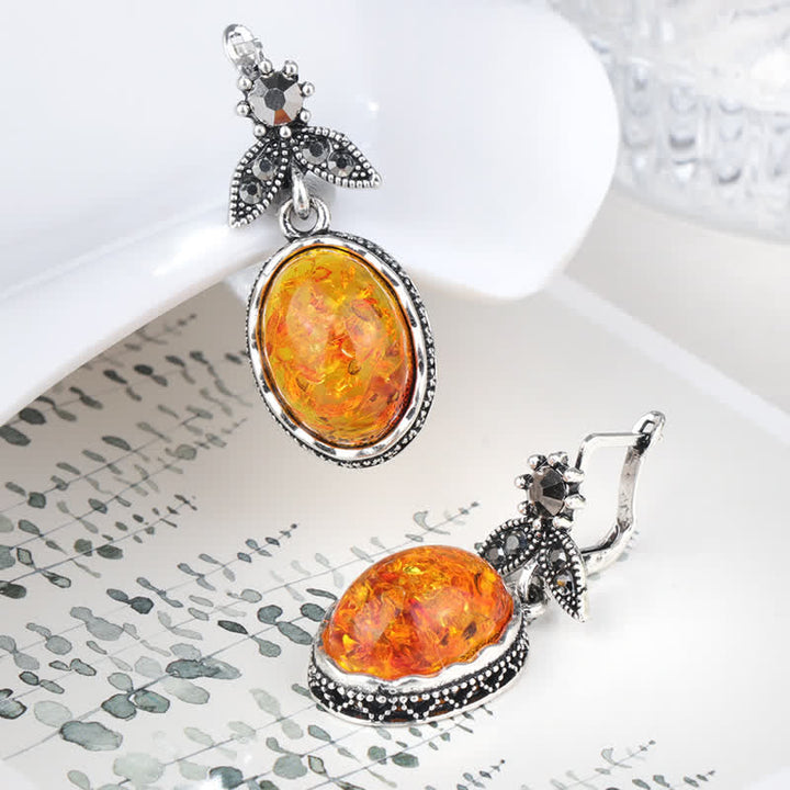 Warm amber flower dangle earrings in a retro silver design, women's vintage style jewelry.