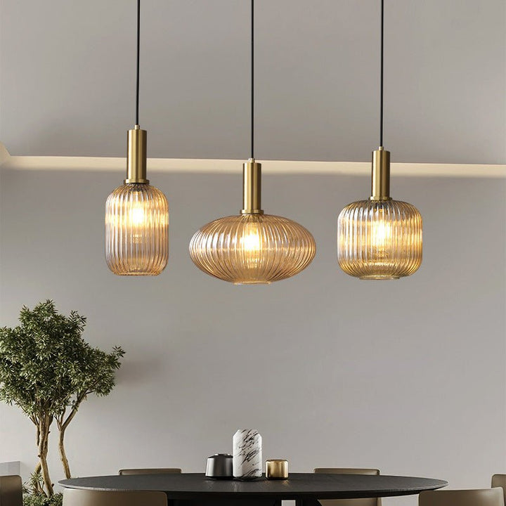 Retro glass pendant light, elegant home decor, ideal for living rooms.