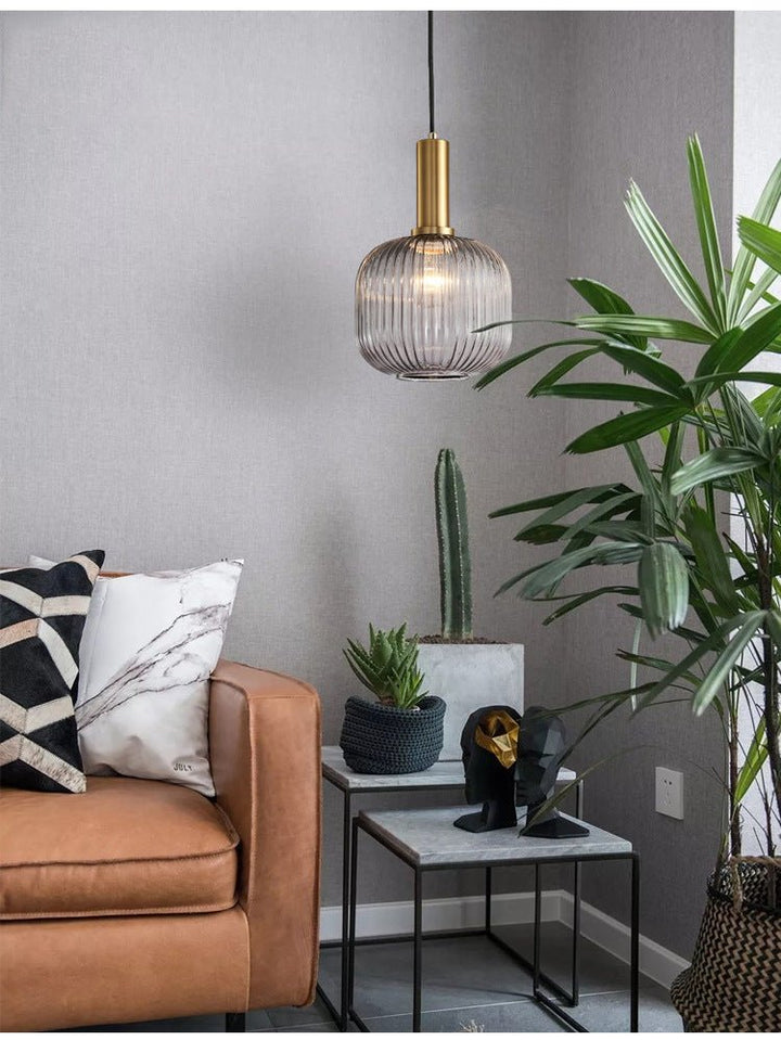 Vintage style glass pendant, adds a touch of retro charm to any room.