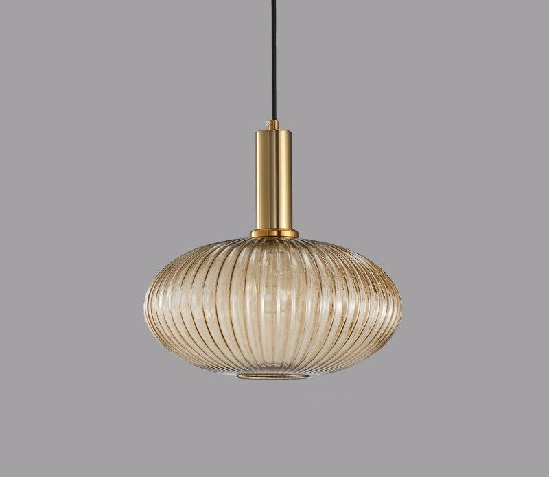 Retro inspired glass fixture, providing stylish and warm interior lighting.