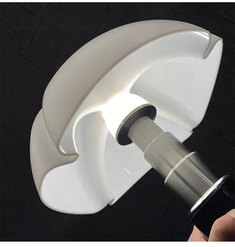 Retro LED table lamp, ClassicGlow, illuminating a bookshelf with its warm, soft ambient light