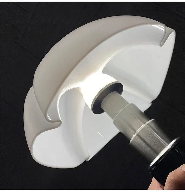 Retro LED table lamp, ClassicGlow, illuminating a bookshelf with its warm, soft ambient light