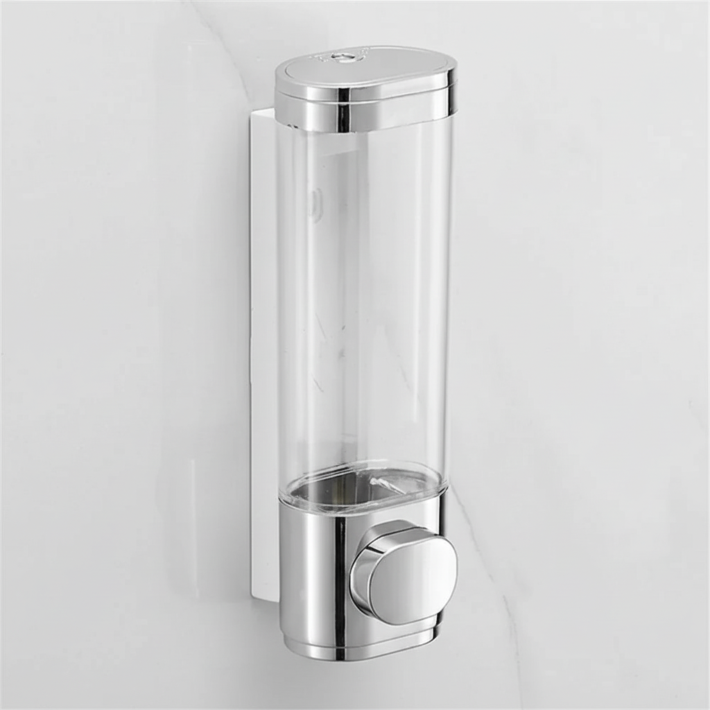 Close-up of a retro wall-mounted soap dispenser, showing vintage details