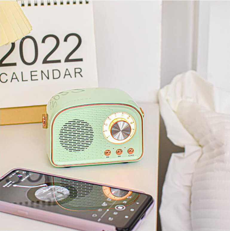 Front view of RetroVibe retro Bluetooth speaker, highlighting its classic grille and FM display.