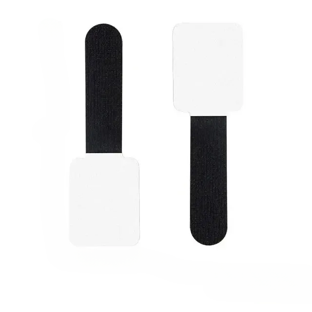 Reusable self-adhesive cable ties for desk organization, managing wires neatly under a desk
