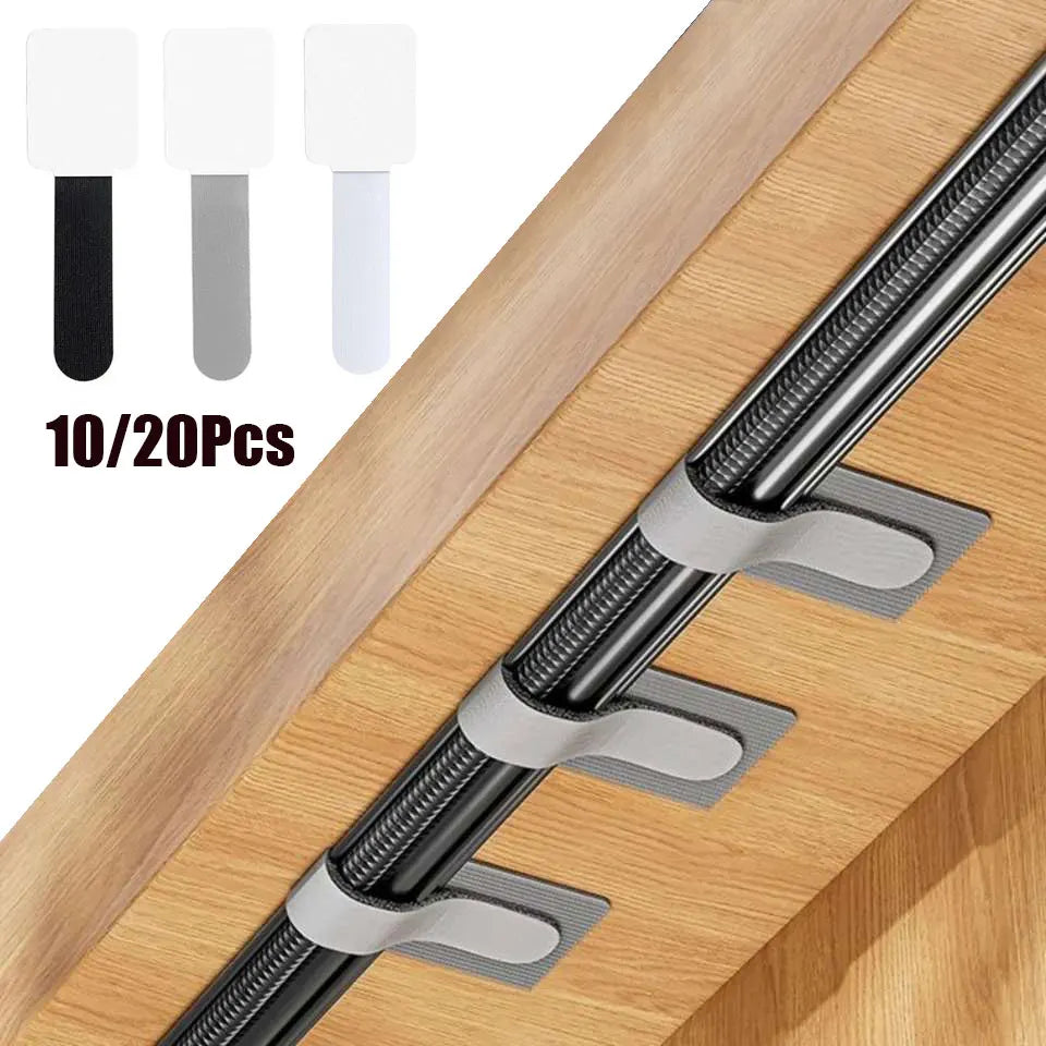 Flexible self-adhesive cable ties wrapped around power cords, organizing an entertainment center