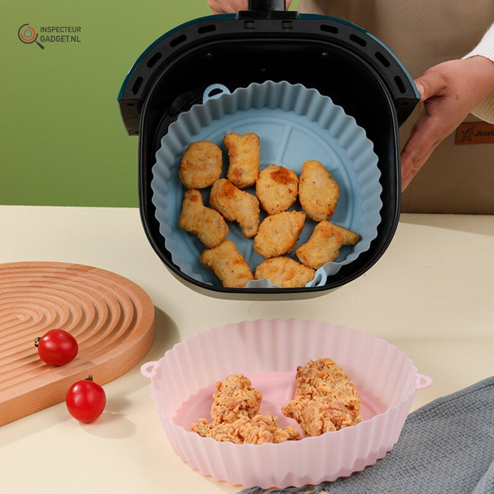 Easy-clean silicone air fryer basket. Reusable, nonstick kitchen accessory for healthy meals.