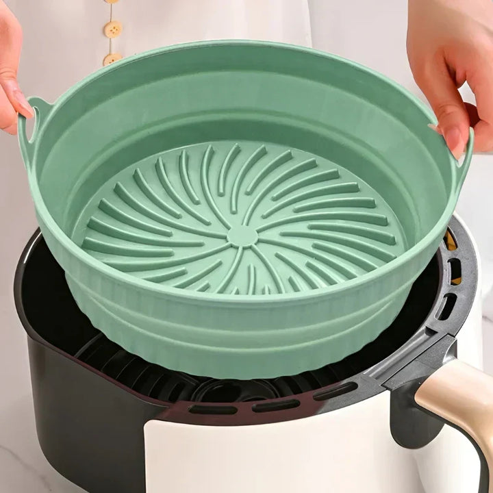 Reusable silicone air fryer mat, non-stick & heat-resistant for healthy cooking.