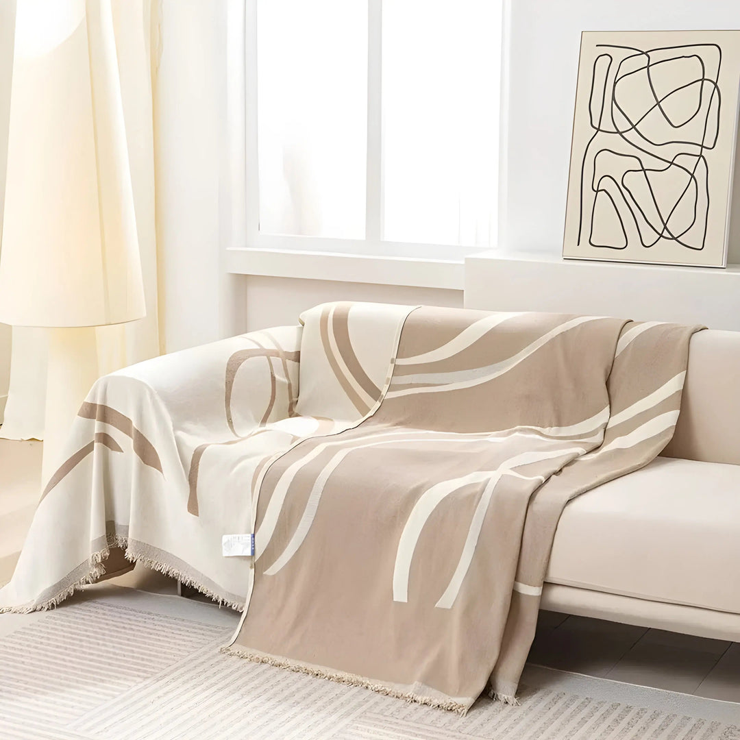 Close-up of reversible gray/khaki chenille cotton sofa cover texture, highlighting soft chenille & durable cotton.