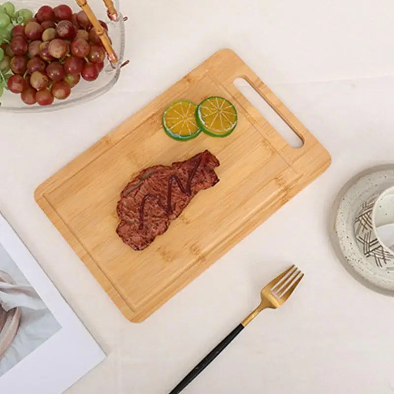 Durable, natural wooden cutting board. Reversible design for kitchen prep, chopping, and elegant food serving.