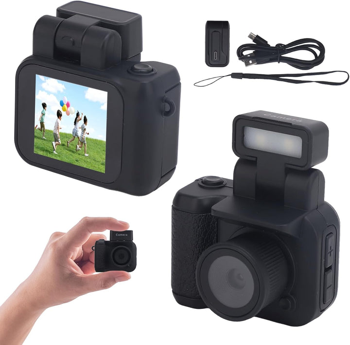 Rivoma Mini Keychain Digital Camera, 1080P retro design, front view, in hand for scale