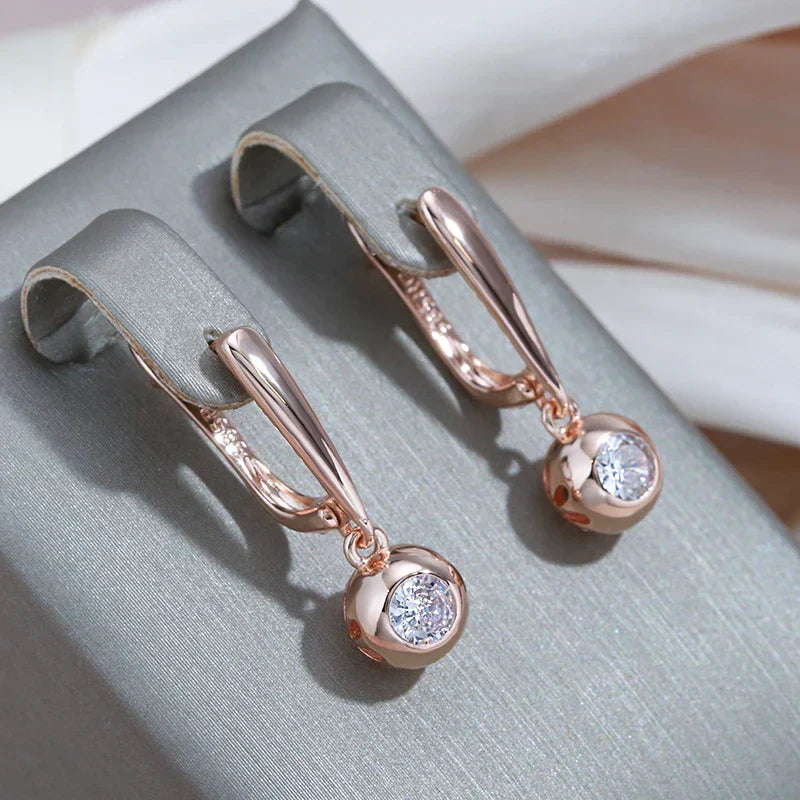Elegant rose gold zircon orb earrings & necklace set for women. Perfect anniversary or special occasion gift.