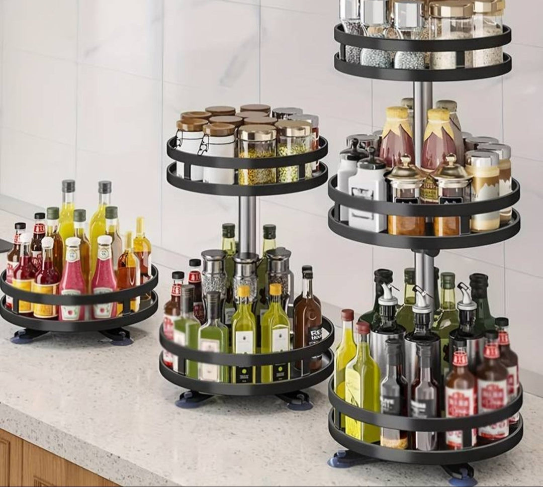 Rotating kitchen organizer rack, stainless steel, perfect for spices & condiments, space-saving.