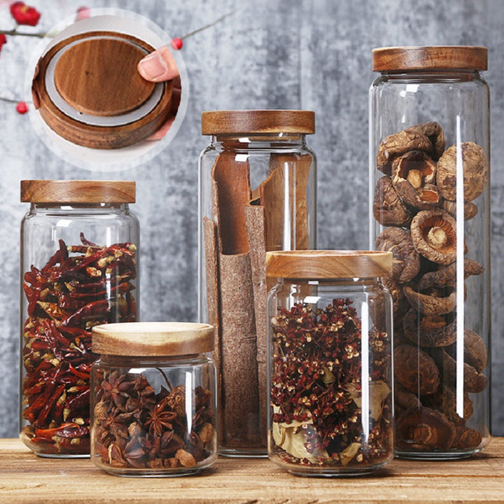 Clear glass food container, airtight, perfect for preserving dry goods in kitchen storage.