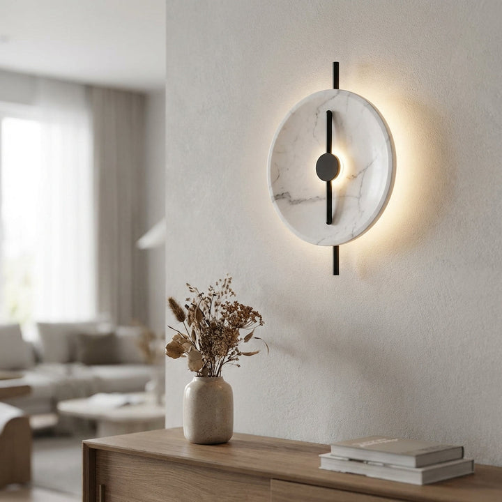 Round Marbelleo marble effect LED wall sconce, modern ambient lighting for home decor.